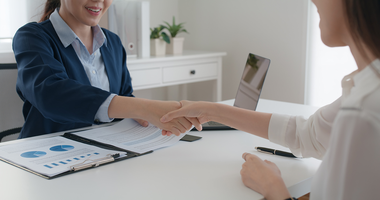 two people going over investment portfolio